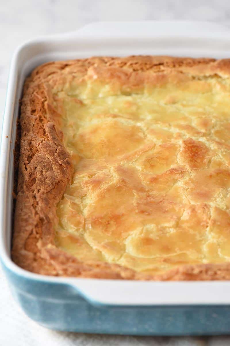 baked gooey butter cake in blue baking dish