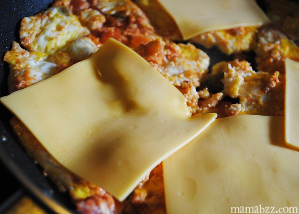 Add cheese to omelets