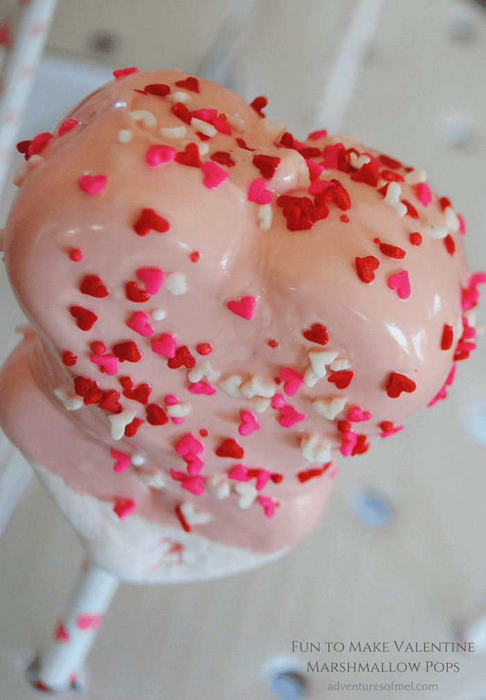 heart shaped Valentines marshmallows on Valentine paper straws