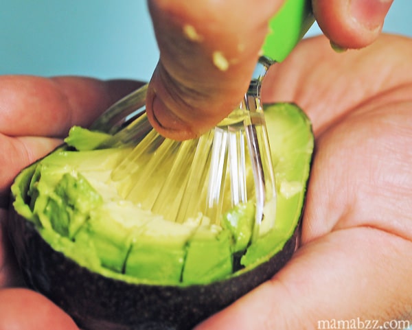 Slicing up the avocado with the Good Cook Avocado Slicer