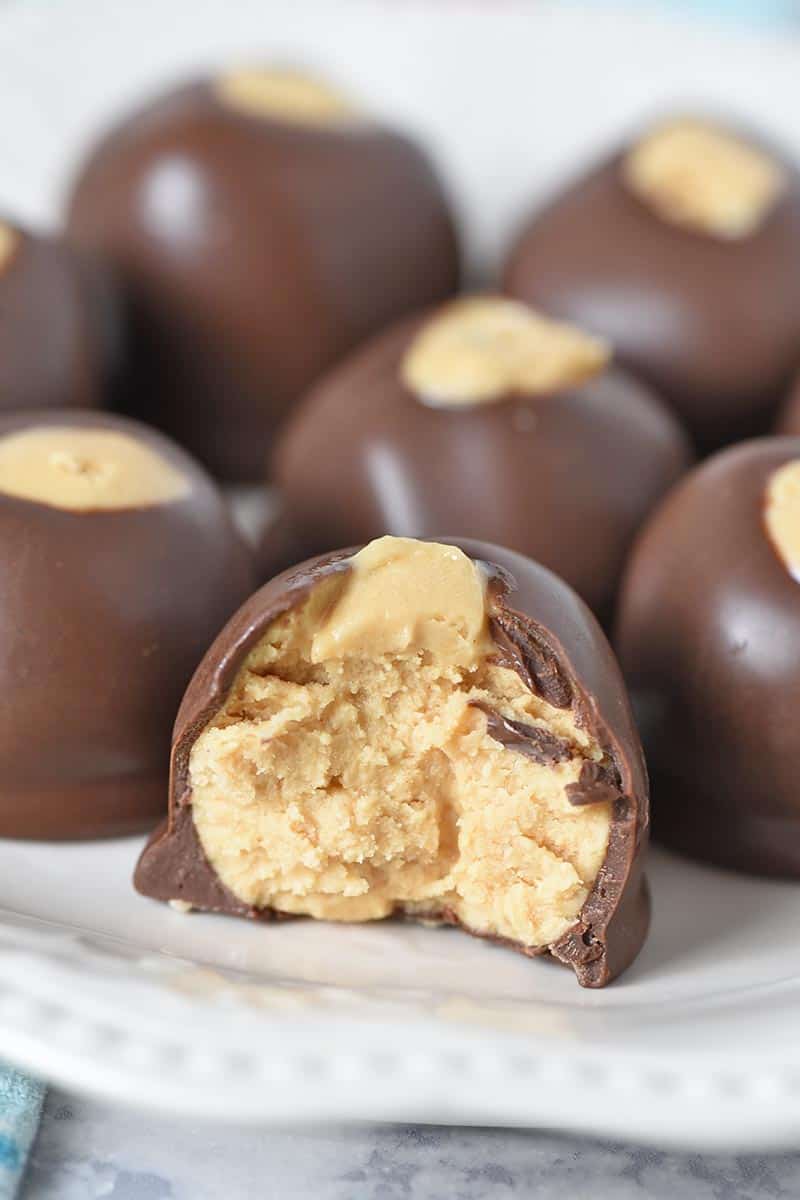 bite out of peanut butter buckeye, yummy easy buckeye recipe