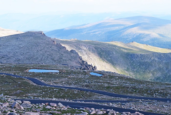 Just beyond Denver, outside Idaho Springs, stands beautiful Mount Evans, a 14,265′ beast of a mountain in the Front Range of the Colorado Rocky Mountains. Travel the highest paved road in North America, the road to the summit of Mount Evans in Colorado.