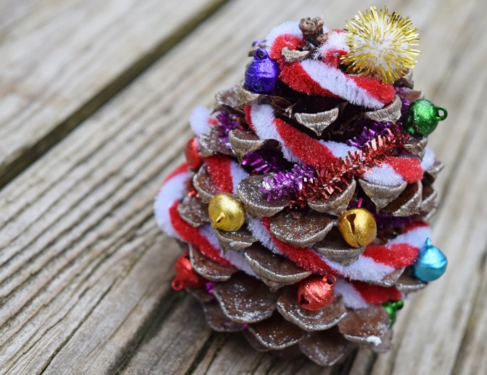 Make Christmas trees out of pinecones, using glue, pipe cleaners, and all sorts of festive embellishments. A pinecone Christmas tree is a great little holiday craft for kids. They also make the cutest, most memorable decorations.