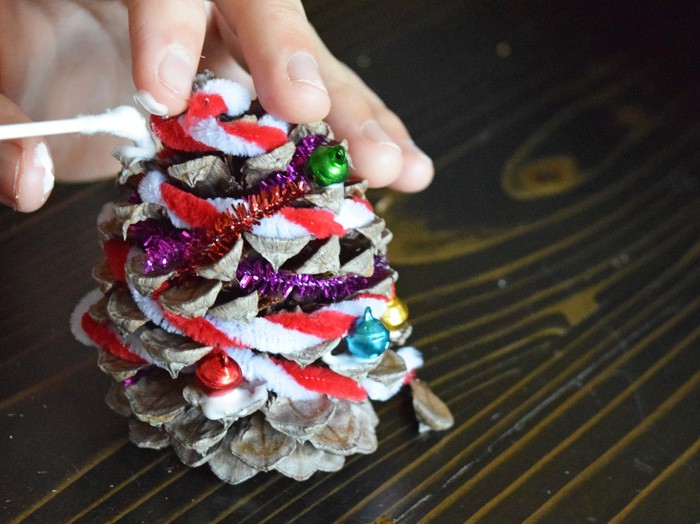 Make Christmas trees out of pinecones, using glue, pipe cleaners, and all sorts of festive embellishments. A pinecone Christmas tree is a great little holiday craft for kids. They also make the cutest, most memorable decorations.