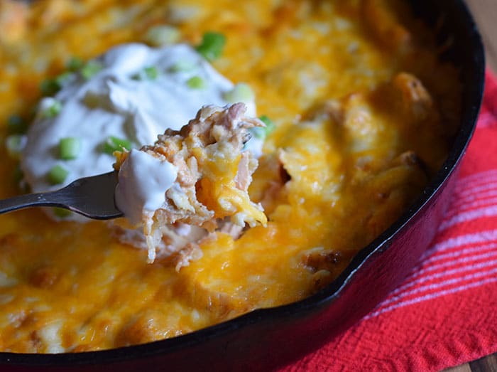 My family loves a good casserole, and this is one casserole recipe to add to the list of recipes to try. Whether you love chicken recipes, enchiladas, or any type of Mexican food, this turkey enchilada casserole is a delicious skillet casserole that can be made with either turkey or chicken. Add it to the list of simple and easy dinner recipes.