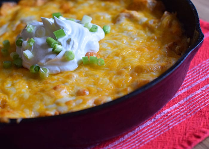 My family loves a good casserole, and this is one casserole recipe to add to the list of recipes to try. Whether you love chicken recipes, enchiladas, or any type of Mexican food, this turkey enchilada casserole is a delicious skillet casserole that can be made with either turkey or chicken. Add it to the list of simple and easy dinner recipes.