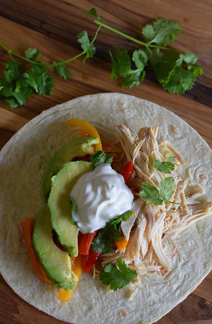 When it comes to week night dinner recipes, we love and need an easy dinner. Easy chicken recipes for the win! Cook a whole chicken in the slow cooker over the weekend; then make that chicken stretch. Chicken fajitas are one of our go-to meals; in fact, I could totally eat Tex-Mex all the time. Grab the recipe for deliciously Easy Chicken Fajitas!