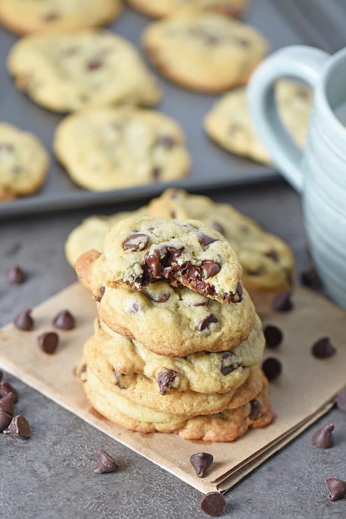 stack of the best chocolate chip cookies ever on a brown paper bag