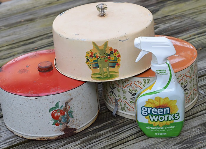 Create a farmhouse kitchen look with DIY light fixtures upcycled from vintage cake tins. How to create a charming look with affordable and simple kitchen lighting.