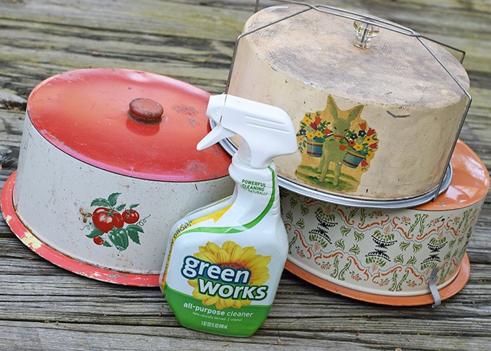 Create a farmhouse kitchen look with DIY light fixtures upcycled from vintage cake tins. How to create a charming look with affordable and simple kitchen lighting.