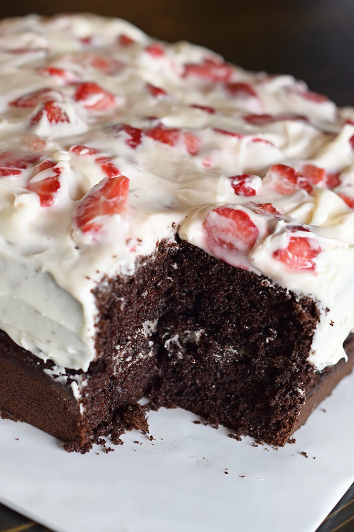Hosting a Minecraft party? Celebrating with a Minecraft birthday? How to make an easy Minecraft cake with a simple cake mix recipe that doubles as a fun kid recipe. Add in Oreos, cream cheese, and strawberries. But be warned! It’s such a scrumptious cake, it will vanish into thin air!