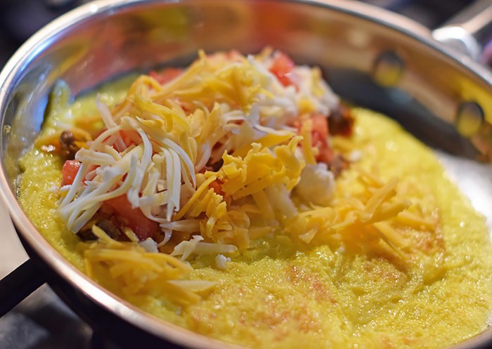 An omelette breakfast is a family favorite. How to make Tex-Mex omelettes using tenderloin tips, vegetables, and cheeses. Breakfast just got tastier than ever.