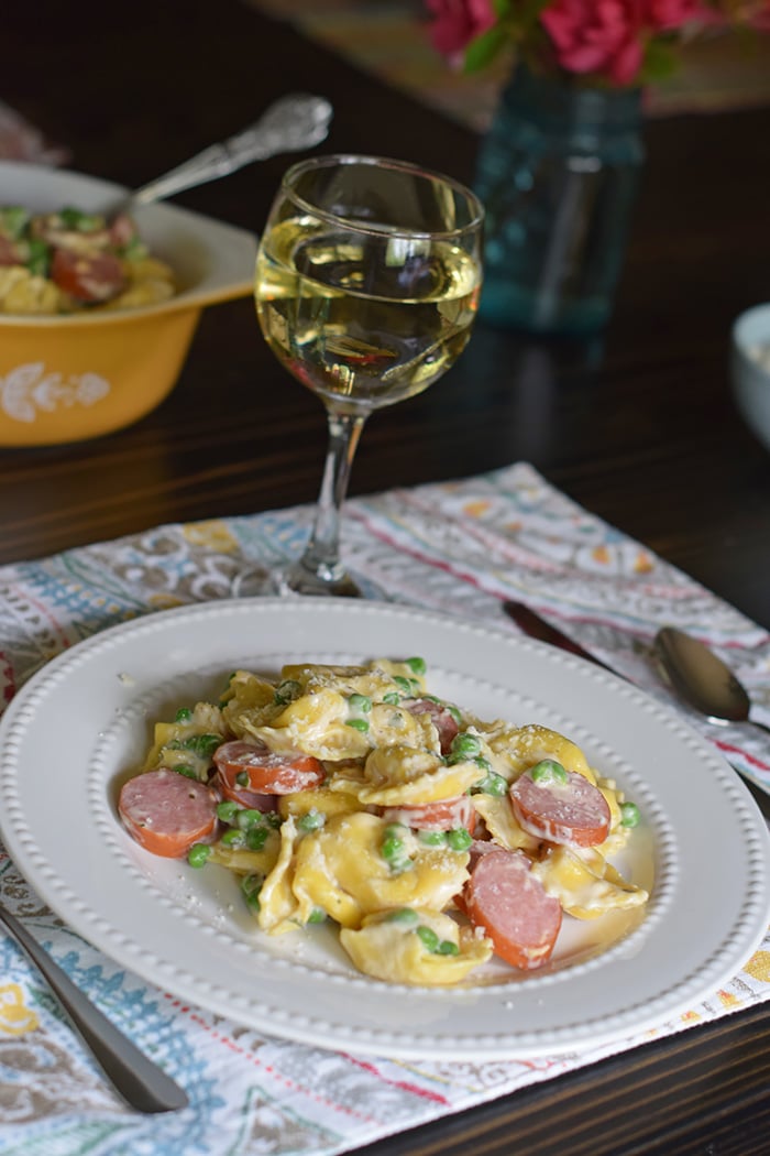 Bring your family back to the dinner table with a spring inspired, Tuscany inspired recipe for Creamy Tortellini Alfredo, a simple family dinner recipe that takes very little time to make, giving you more time with the ones you love. And don’t forget to add a few special touches to the table; after all, it’s the little things in life that are worth celebrating.