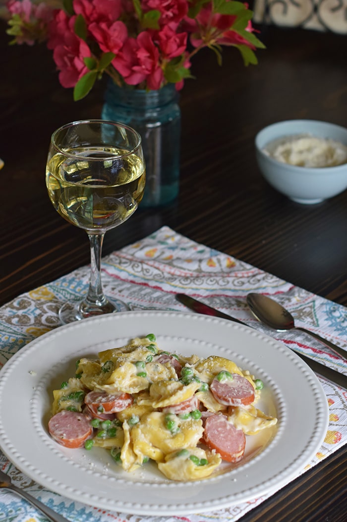Bring your family back to the dinner table with a spring inspired, Tuscany inspired recipe for Creamy Tortellini Alfredo, a simple family dinner recipe that takes very little time to make, giving you more time with the ones you love. And don’t forget to add a few special touches to the table; after all, it’s the little things in life that are worth celebrating.