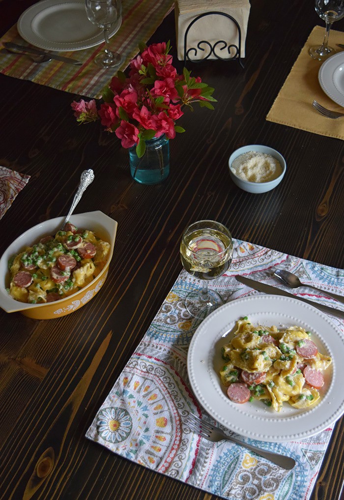 Bring your family back to the dinner table with a spring inspired, Tuscany inspired recipe for Creamy Tortellini Alfredo, a simple family dinner recipe that takes very little time to make, giving you more time with the ones you love. And don’t forget to add a few special touches to the table; after all, it’s the little things in life that are worth celebrating.
