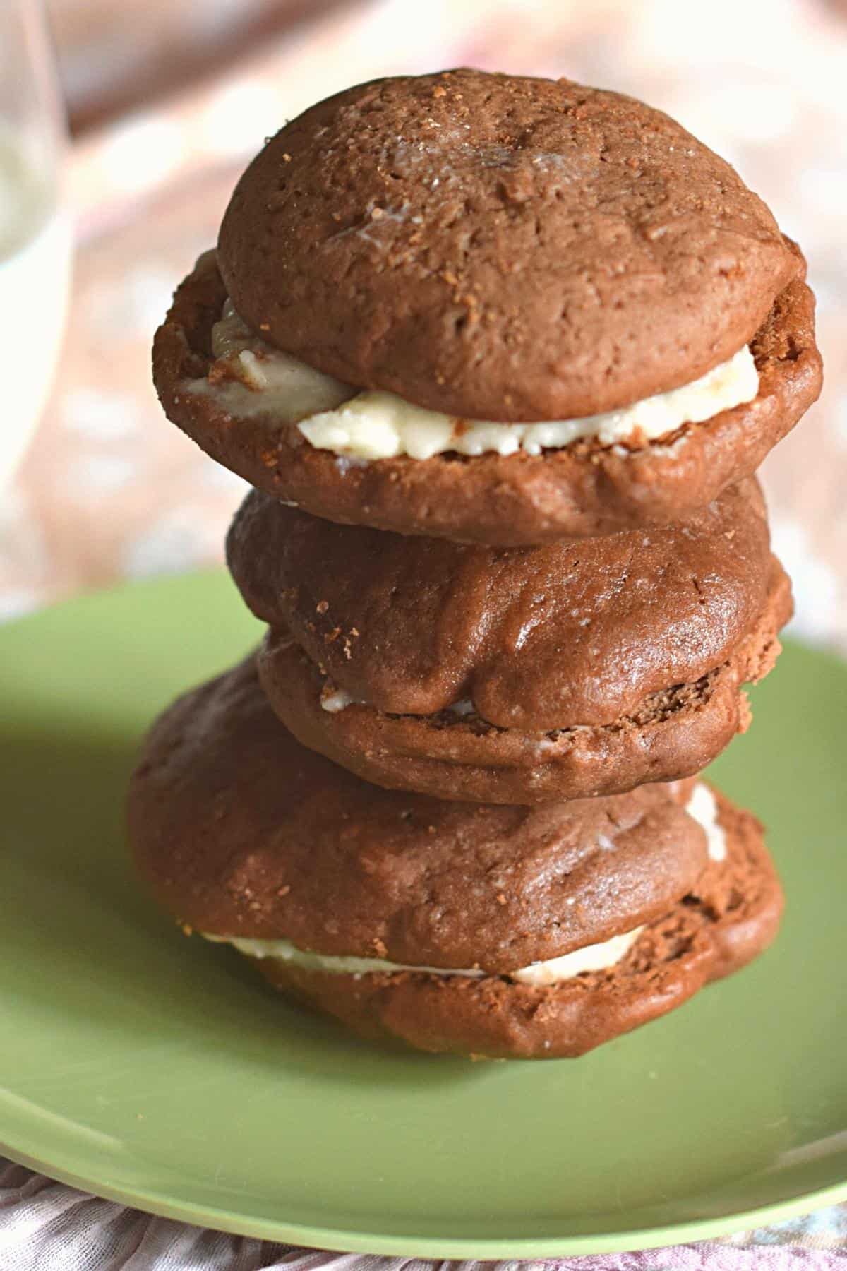 stack of chocolate whoopie pies on green Texas Ware saucer plate