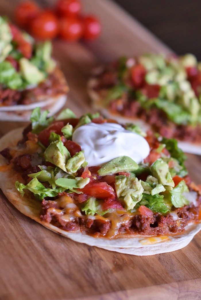 Homemade is way better, especially when it comes to Homemade Mexican Pizza with All the Fixin’s, like lettuce, tomatoes, and avocados. Enjoy a simple recipe that makes a delicious family meal and curbs those cravings for your favorite Mexican and Tex-Mex food.