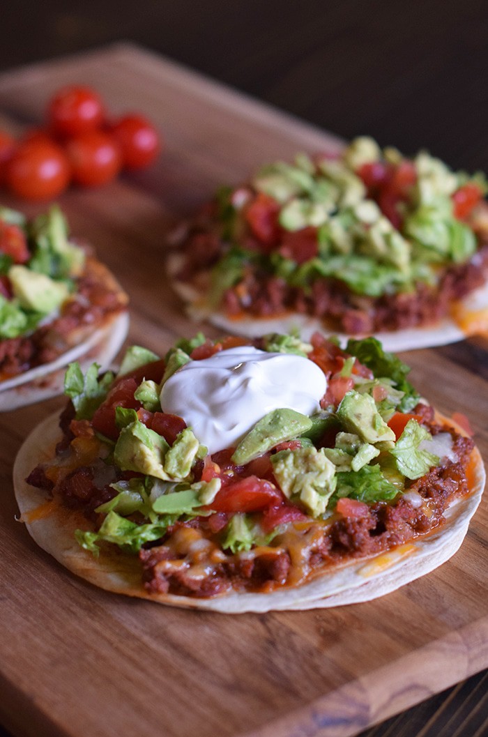 Homemade is way better, especially when it comes to Homemade Mexican Pizza with All the Fixin’s, like lettuce, tomatoes, and avocados. Enjoy a simple recipe that makes a delicious family meal and curbs those cravings for your favorite Mexican and Tex-Mex food.