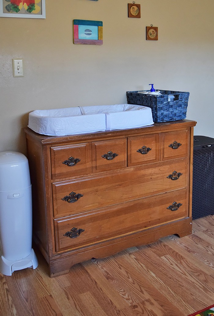 How to create a DIY changing table from a dresser and make your own homemade baby wipes, along with a few tips for adding joy to spring cleaning and organizing your home, whether in the baby’s room or elsewhere.