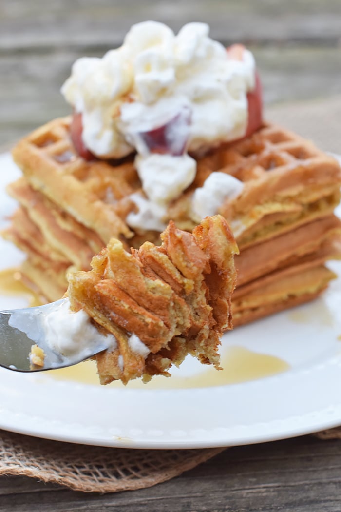 With peaches in the batter and peaches sliced on top, Peaches and Cream Waffles have a light peachy taste with a hint of cinnamon. Top them off with whipped cream and real maple syrup, and serve for a scrumptious breakfast or breakfast for dinner. Printable recipe!