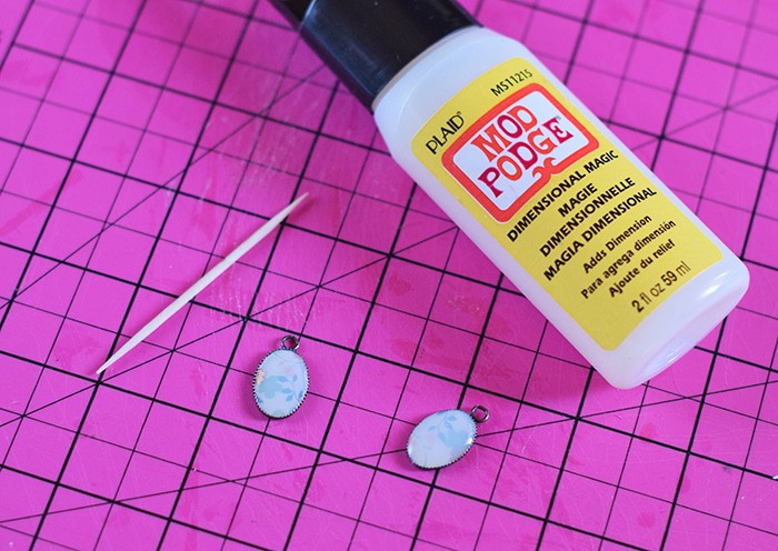 Love finding Mod Podge ideas? Me too! Here’s an easy tutorial for making your own DIY earrings with Mod Podge Dimensional Magic and scrapbook paper. Homemade jewelry with your own special touch!