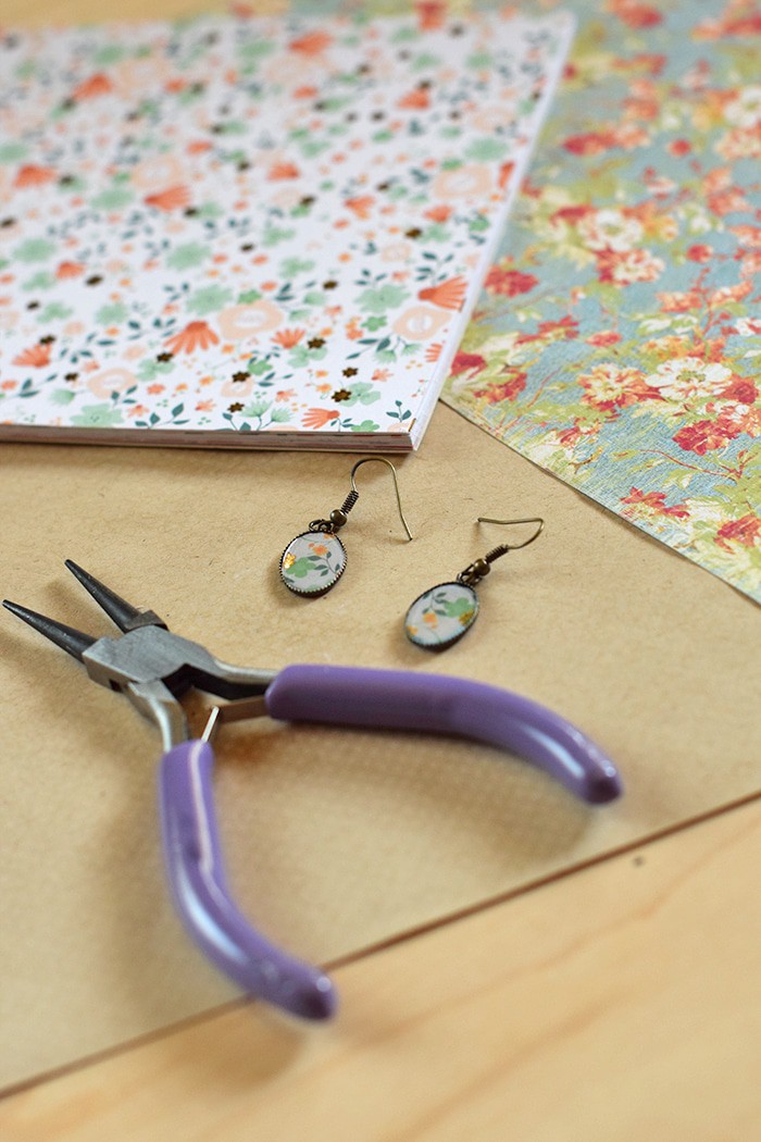 Love finding Mod Podge ideas? Me too! Here’s an easy tutorial for making your own DIY earrings with Mod Podge Dimensional Magic and scrapbook paper. Homemade jewelry with your own special touch!