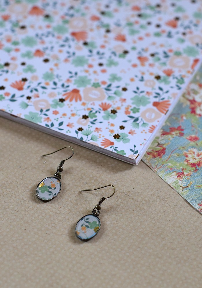 Love finding Mod Podge ideas? Me too! Here’s an easy tutorial for making your own DIY earrings with Mod Podge Dimensional Magic and scrapbook paper. Homemade jewelry with your own special touch!