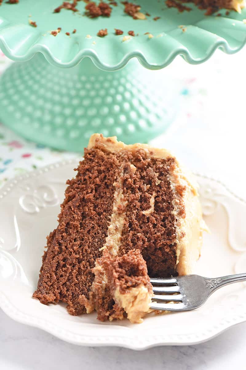 Fork bite out of homemade chocolate cake slice