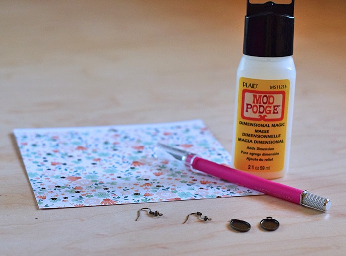 Love finding Mod Podge ideas? Me too! Here’s an easy tutorial for making your own DIY earrings with Mod Podge Dimensional Magic and scrapbook paper. Homemade jewelry with your own special touch!