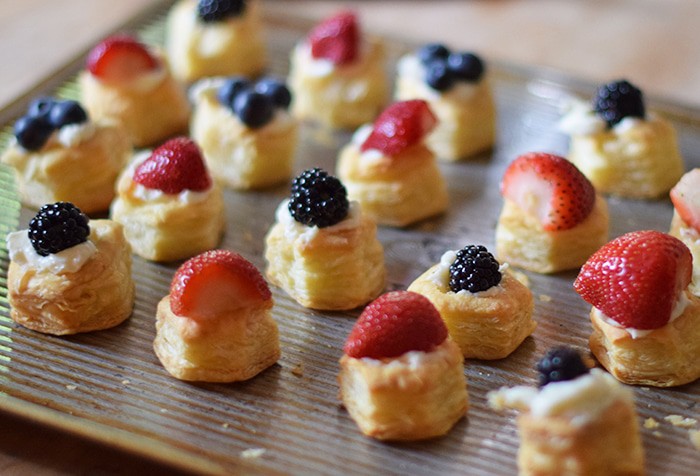 Fruit Pizza is one of my family’s favorite desserts. Fruit Pizza Bites, made with strawberries, blueberries, and blackberries, is a spin-off made with Puff Pastry Cups, and it’s so kid-friendly to make, perfect for summer. Grab the printable recipe!