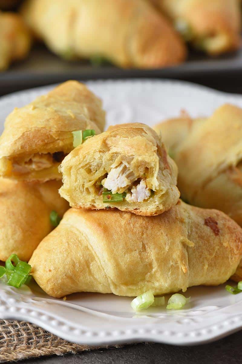 sliced leftover turkey crescent rolls on white plate