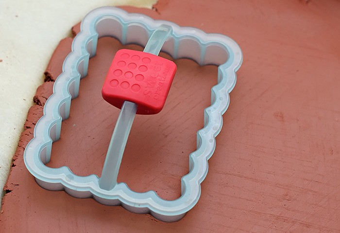 Use Air-Dry Clay, Christmas cookie cutters, and acrylic stamps to make the simplest of crafts, Clay Diffuser Ornaments. They're beautifully festive decorations for the Christmas season, and they add a touch of essential oil scents to both your tree and home.