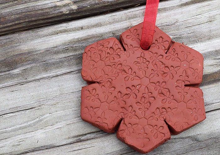Use Air-Dry Clay, Christmas cookie cutters, and acrylic stamps to make the simplest of crafts, Clay Diffuser Ornaments. They're beautifully festive decorations for the Christmas season, and they add a touch of essential oil scents to both your tree and home.