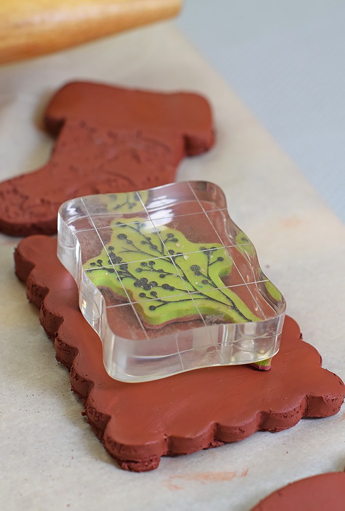 Use Air-Dry Clay, Christmas cookie cutters, and acrylic stamps to make the simplest of crafts, Clay Diffuser Ornaments. They're beautifully festive decorations for the Christmas season, and they add a touch of essential oil scents to both your tree and home.