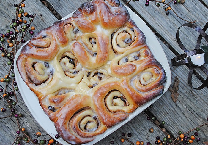 Cozy up with the best most scrumptious cinnamon rolls recipe ever! My mom taught me how to make these cinnamon rolls. This recipe also happens to be my grandma's bread rolls recipe with just a few extra steps added to make cinnamon rolls. Homemade cinnamon rolls make the perfect breakfast treat, especially on a cold day when it's nice and warm inside. 