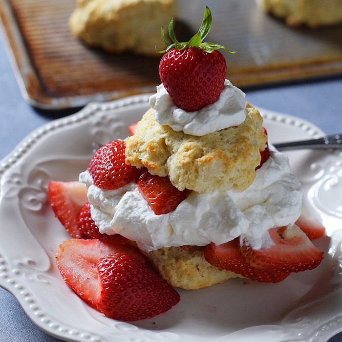 Strawberry Shortcake made with a cream cheese whipped cream, Grandma's biscuits, and juicy red strawberries! Print the recipe for Old-Fashioned Strawberry Shortcake with Grandma's Biscuits.