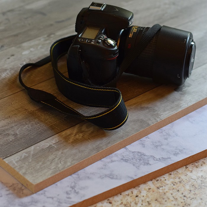 Use Contact Paper and Adhesive Vinyl to make your own photography background boards. How to make a beautiful DIY photography background on the cheap!