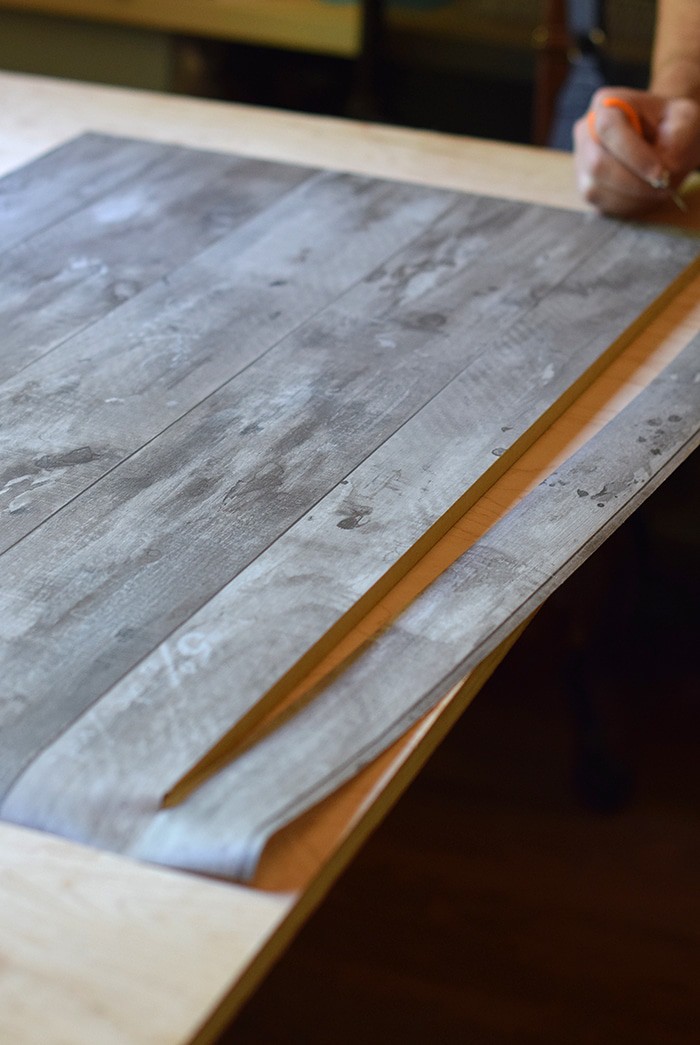 Use Contact Paper and Adhesive Vinyl to make your own photography background boards. How to make a beautiful DIY photography background on the cheap! 