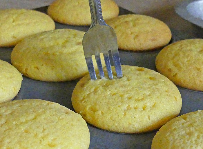 One of my family's favorite desserts is lemon cake. Transform lemon cake into the most scrumptious poke cake lemon cupcakes, topped with a thin, slightly crispy, sweet but tarty lemon icing. Such a delicious and easy dessert recipe!