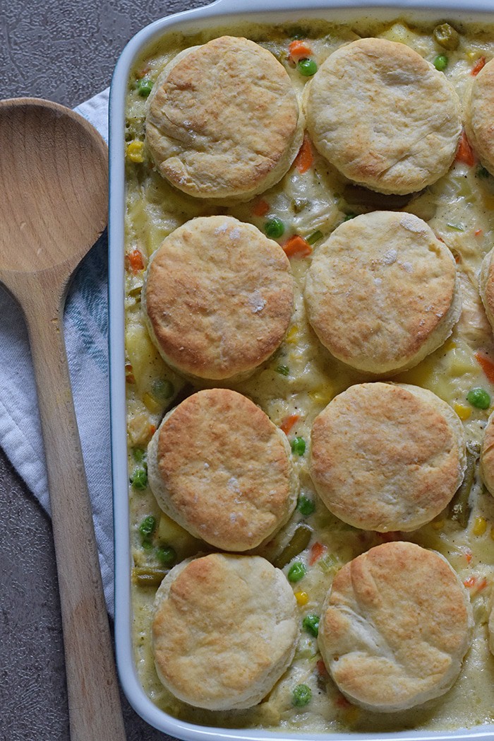 Chicken Pot Pie with biscuits, filled with a medley of vegetables in a creamy delicious sauce, seasoned with sage. Ultimate comfort food dinner recipe.
