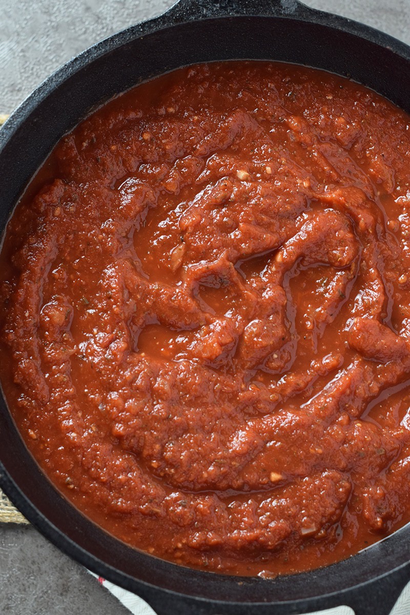 How to make homemade pasta sauce. Easy recipe. Add meat or go meatless. We love this sauce for spaghetti, pizza, lasagna, and more.