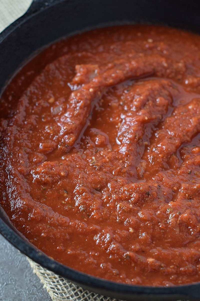 Easy Homemade Pasta Sauce perfect for your favorite pasta dishes. Make ahead and freeze for quick and easy weeknight meals.