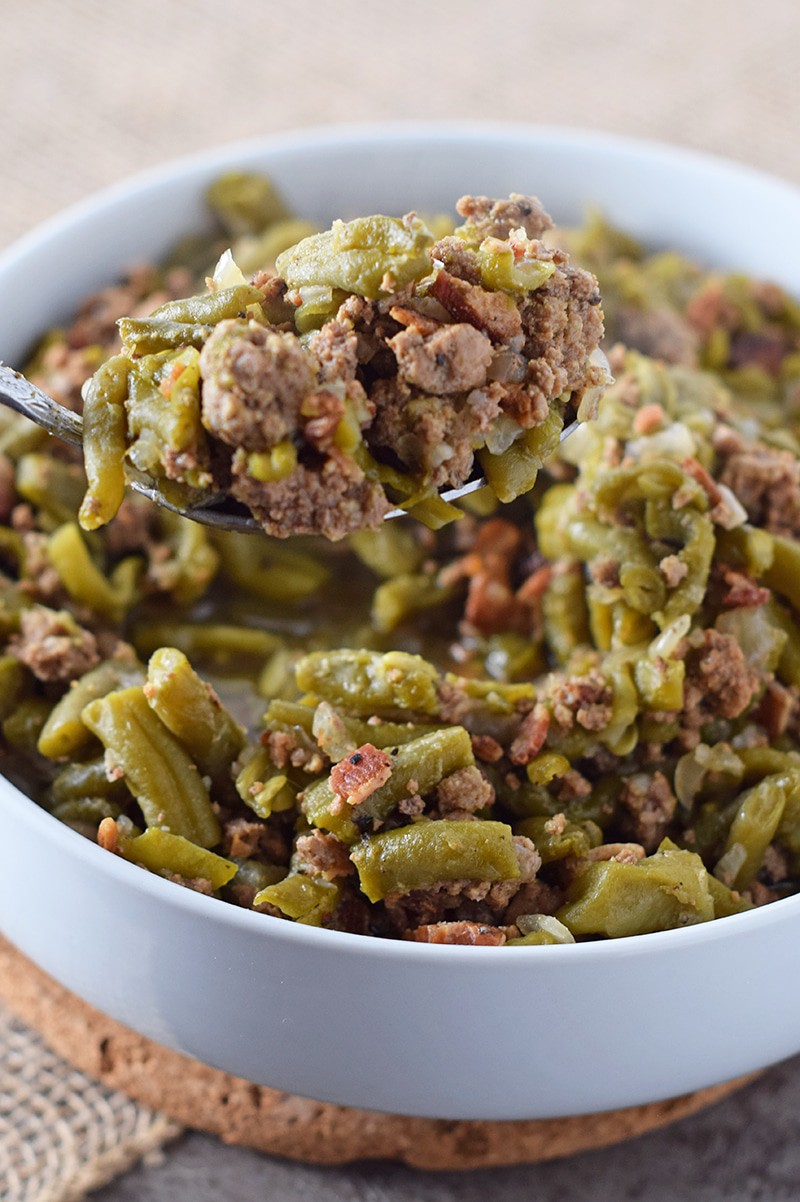How to make the most delicious Southern Green Beans in the Instant Pot. Full of flavor and cooked with bacon.