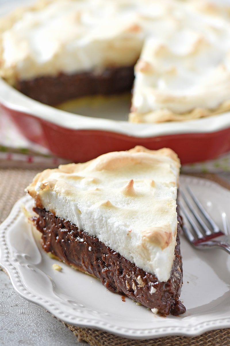 How to make a creamy delicious Chocolate Meringue Pie your family will love. Don’t let this dessert intimidate you; it’s actually a pretty easy dessert recipe to make!