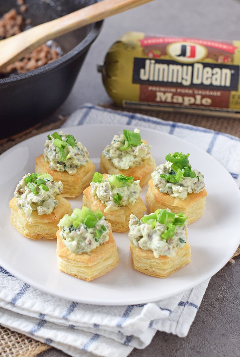 Delicious appetizer idea for holiday parties and family celebrations, Maple Sausage Stuffed Pastry Bites. Easy recipe that only takes about 30 minutes to make!