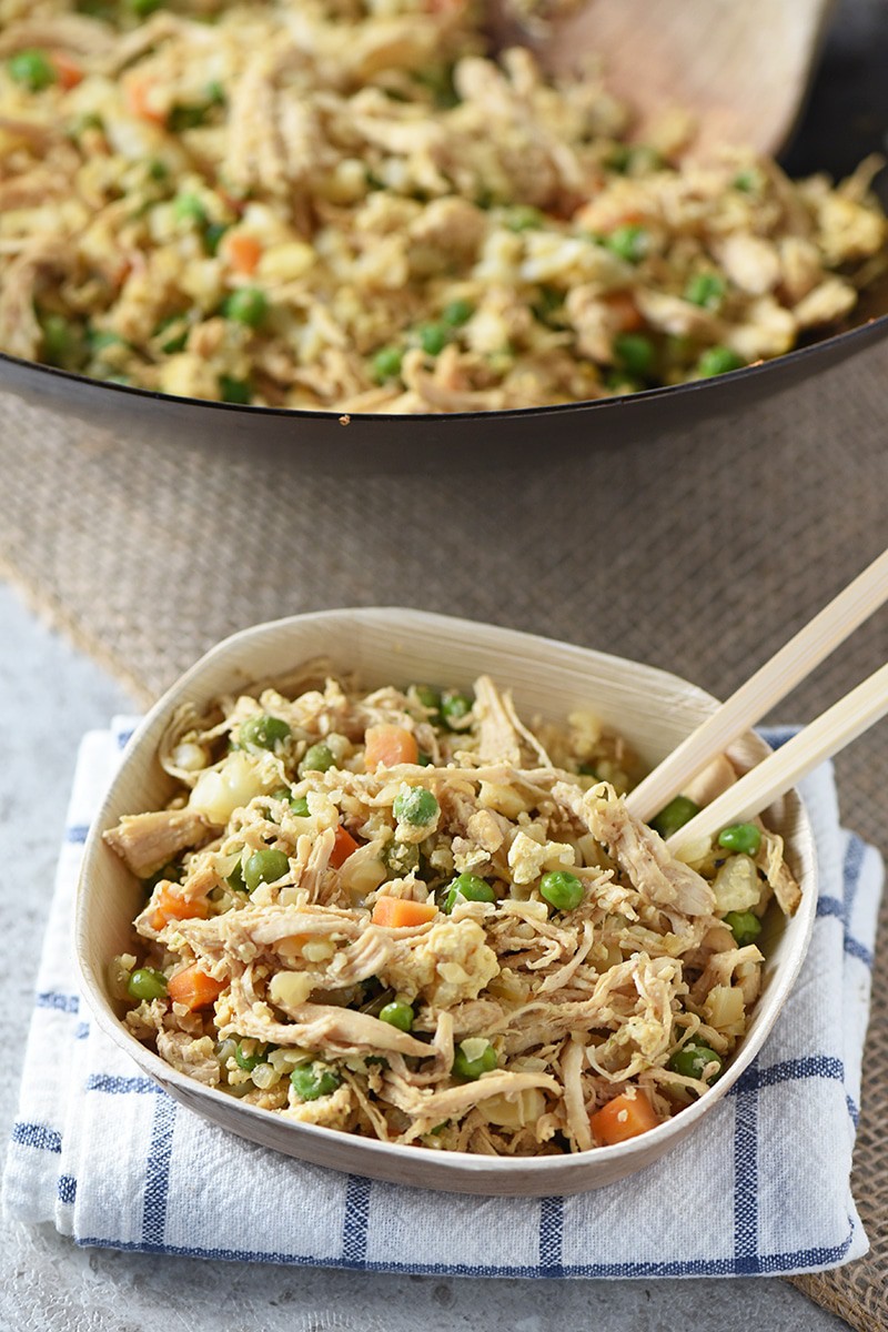 Stuck in a dinner rut? Make an easy recipe for Cauliflower Chicken Fried Rice, and put on a movie. Homemade takeout and a movie with your family!