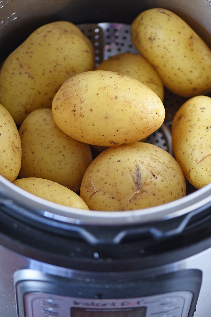 Baked Potatoes are so quick and easy to make in the Instant Pot. And Instant Pot Baked Potatoes come out cooked to perfection, so tender, moist, and delicious.