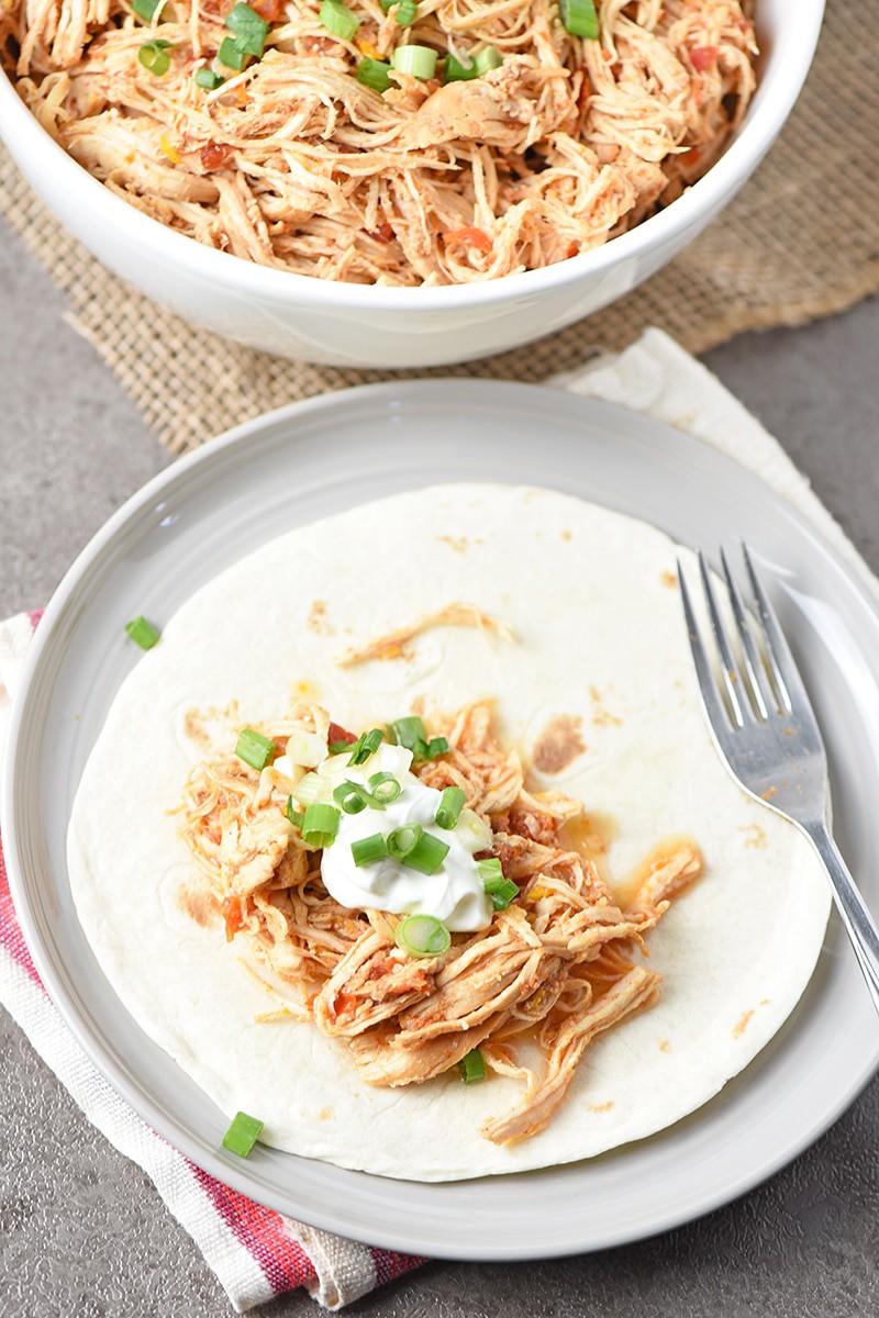 Instant Pot Taco Chicken on a Tortilla with Green Onions