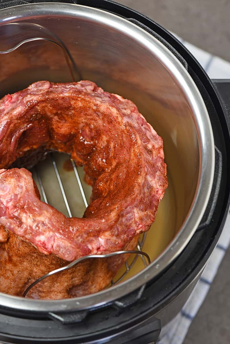 home cooking baby back ribs in a pressure cooker