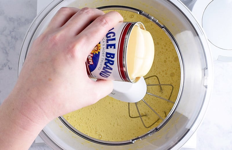add a can of sweetened condensed milk to strawberry ice cream mixture